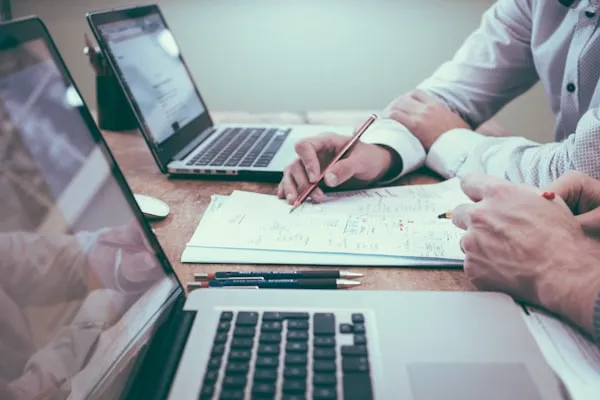 Calculator and financial documents for SMSF setup and compliance